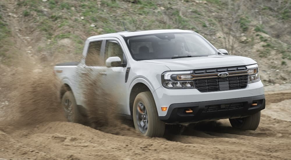 A grey 2024 Ford Maverick Tremor is shown from the front at an angle after leaving a dealer that has Ford trucks for sale near Poughkeepsie