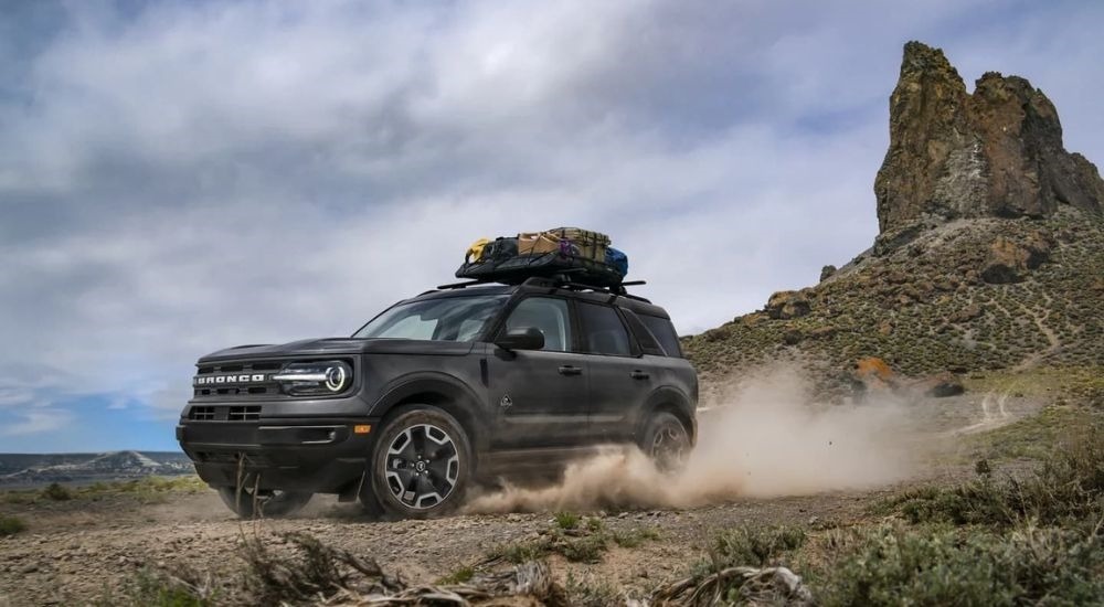 A grey 2024 Ford Bronco Sport Outer Banks is shown off-roading
