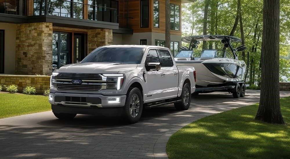 White 2026 Ford F-150 towing a boat