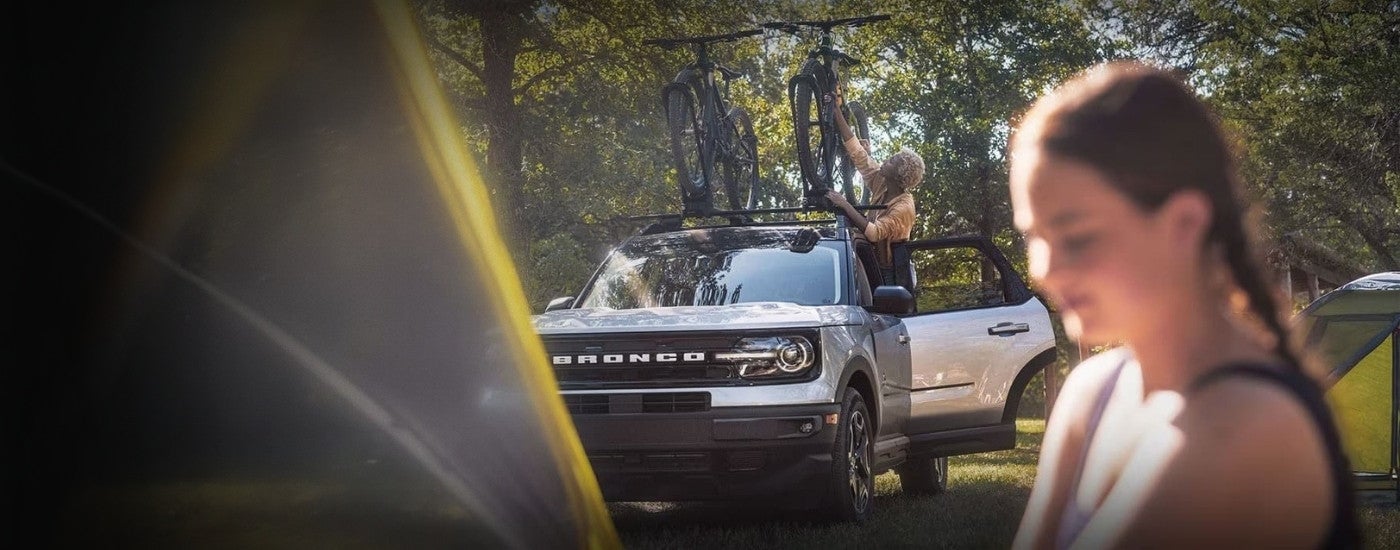Silver 2023 Ford Bronco Sport parked at a camp site