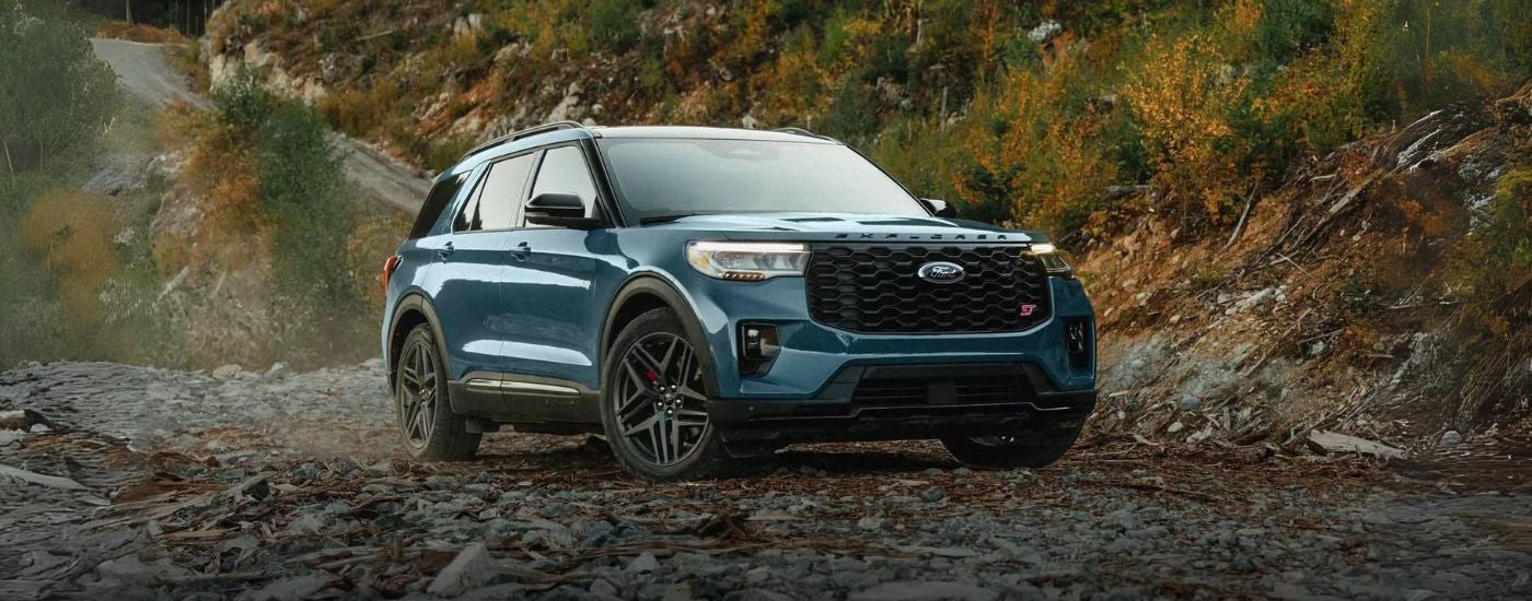 Blue 2026 Ford Explorer ST parked off-road