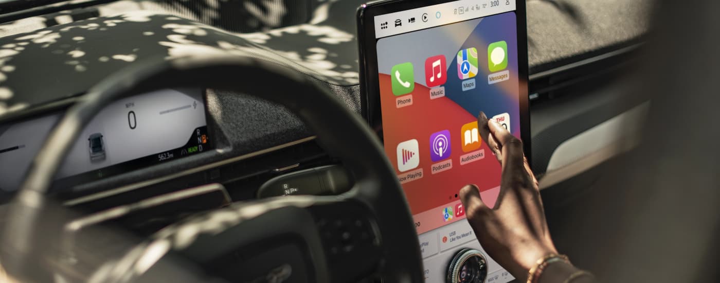 Steering wheel and infotainment screen in a 2026 Ford Mustang Mach-E