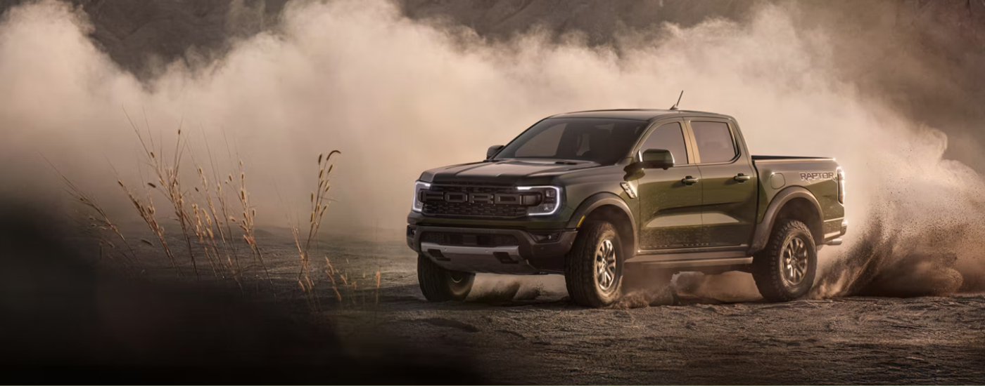 Black 2026 Ford Ranger Raptor drifting off-road