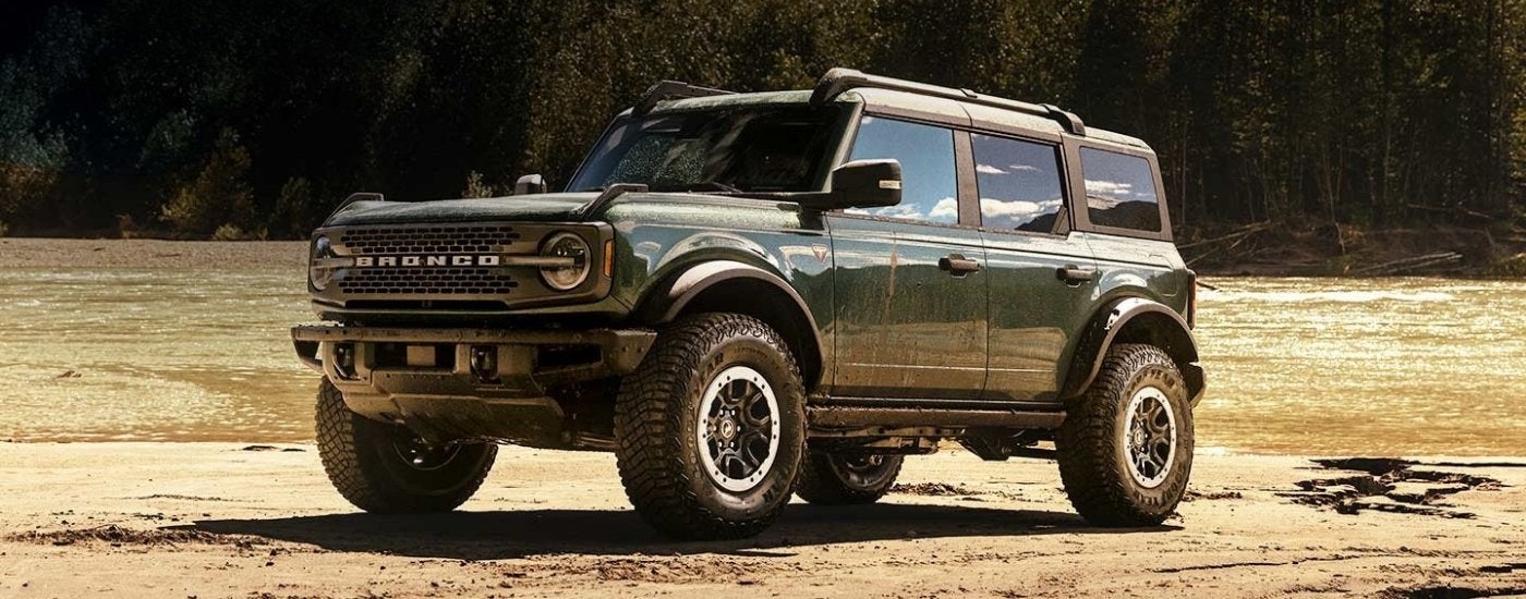 Black 2024 Ford Bronco Badlands parked at an angle off-road